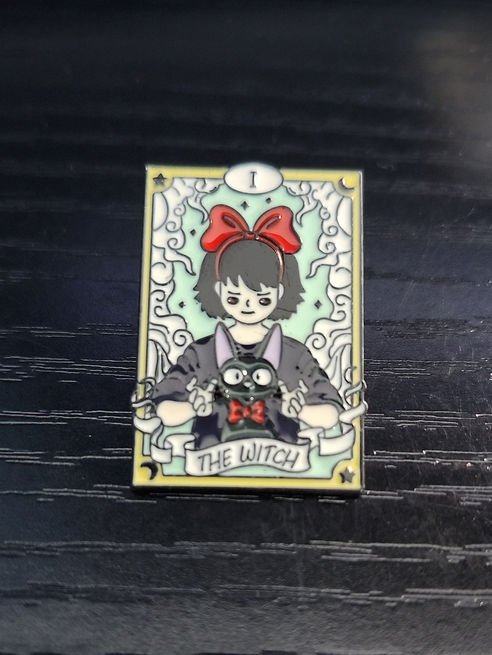 Studio Ghibli inspired tarot enamel pin depicts Kiki as "TheWitch"